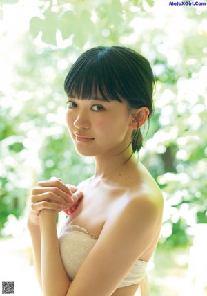 A series of four pictures of a woman in a white dress.